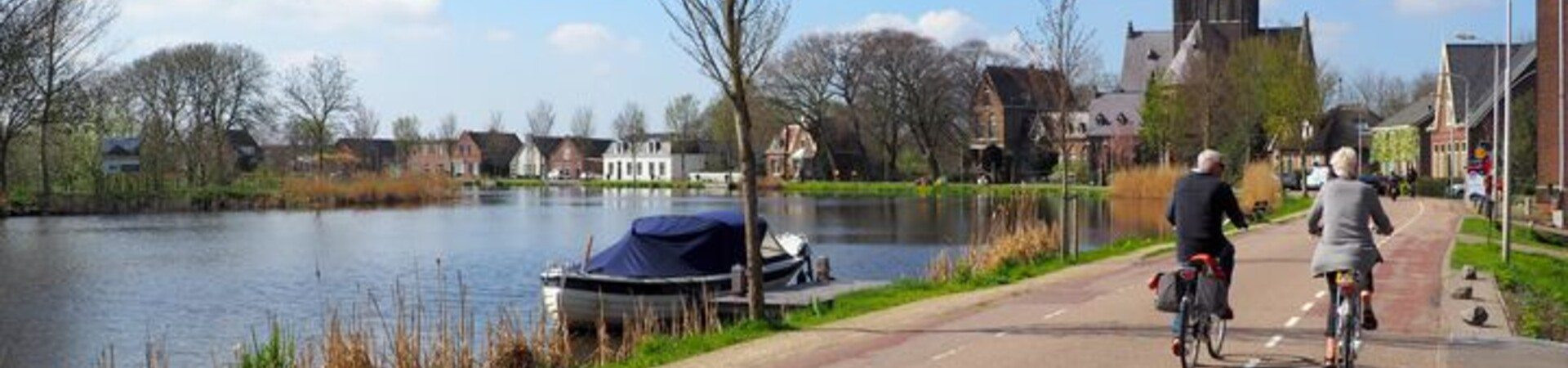 Cyclistes le long de la rivière Amstel - Pays-Bas