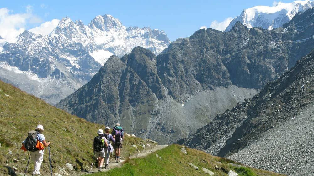 Hikers on a mountain trail - Valais Alps - Switzerland