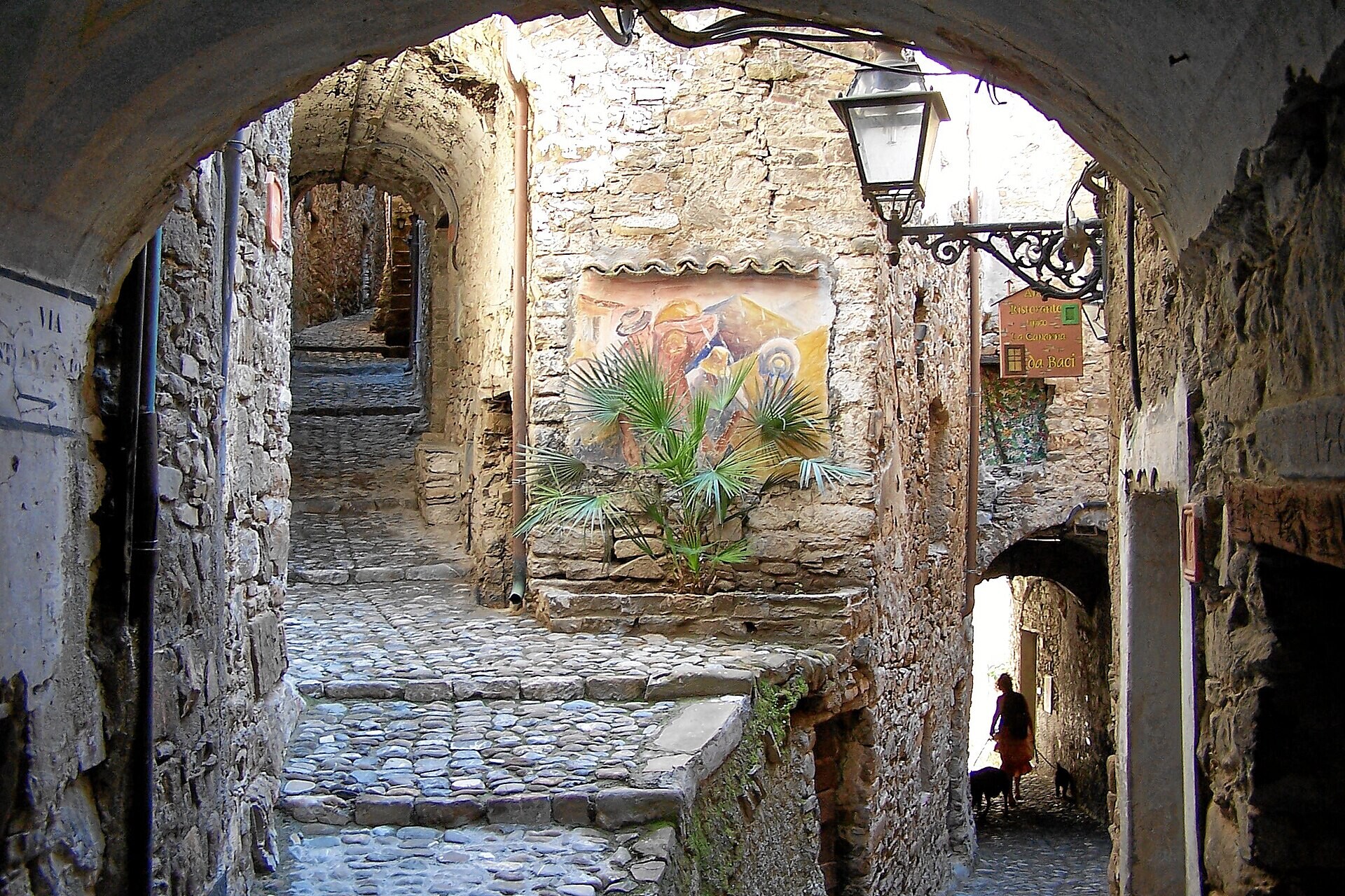 Covered lane and wall painting - Apricale - Liguria Italy