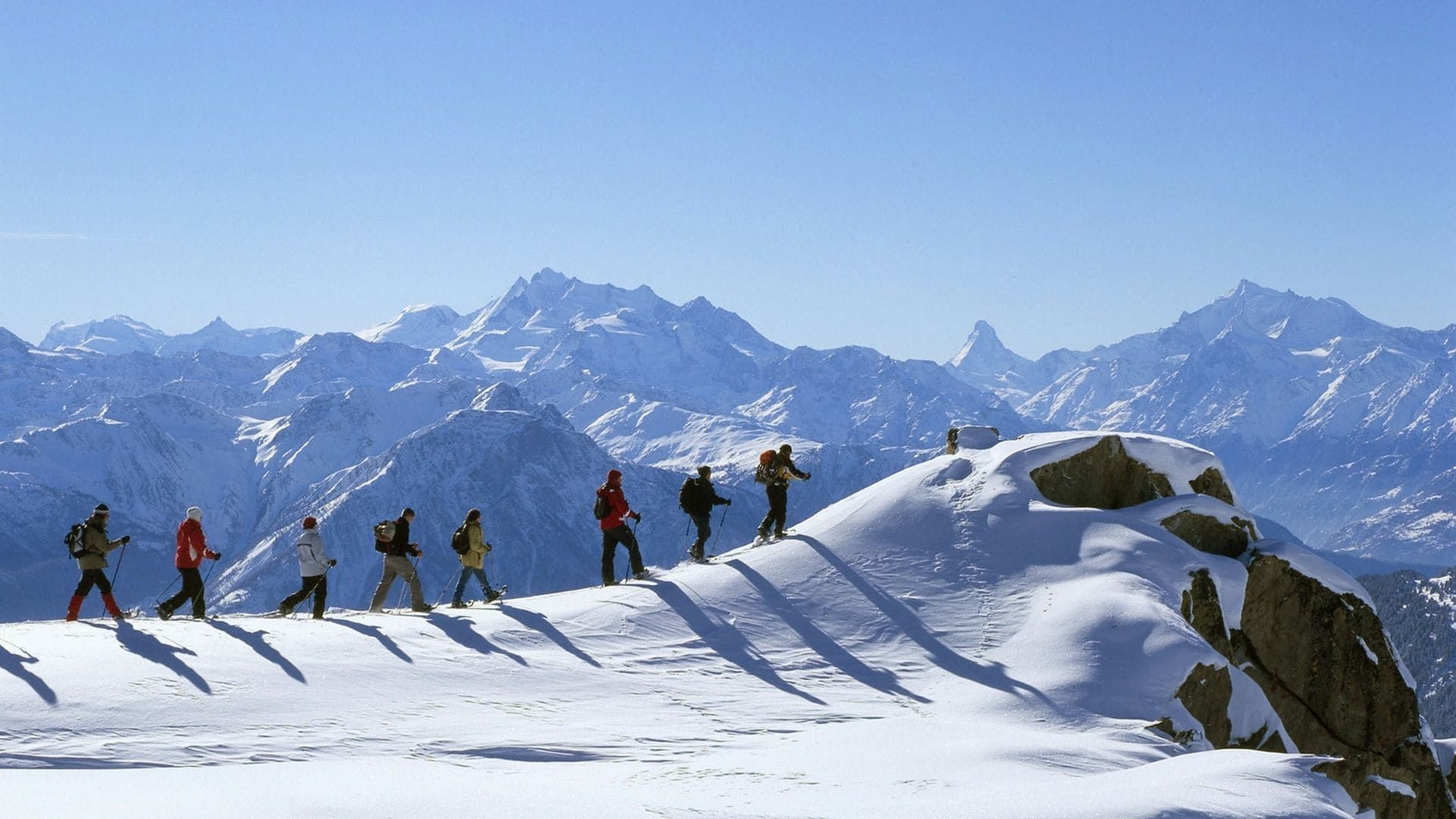 © Salina Maris Raquettes près d'Aletsch - Suisse