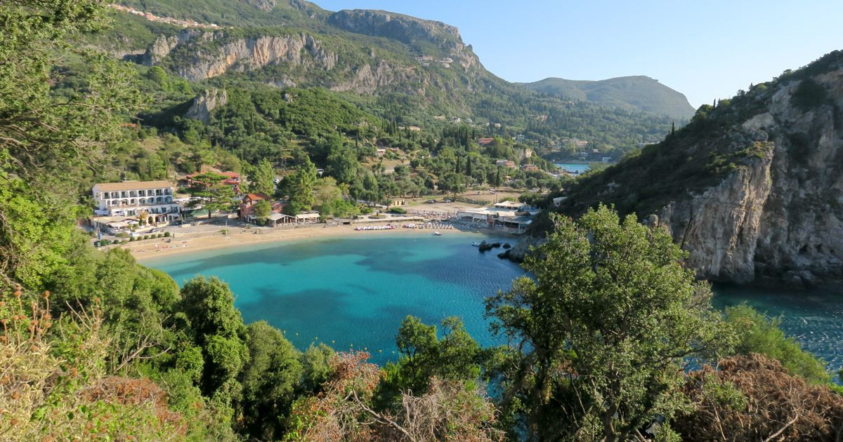 Turquoise cove surrounded by mountains - Corfu - Greece
